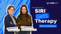 Two women, one identified as Susan Bennett, labeled "The Original Voice of Siri," and the other as Dr. Orna Guralnik from Showtime's "Couples Therapy," stand side by side against a blue background with a promotional message for "SIRI Gets Therapy." The UserWay logo is present in the top right corner, and there's a call to action to "Watch now @UserWay.org".