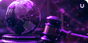 A small globe sits on a sounding block on the left with a gavel on the right, with everything sitting on a desk