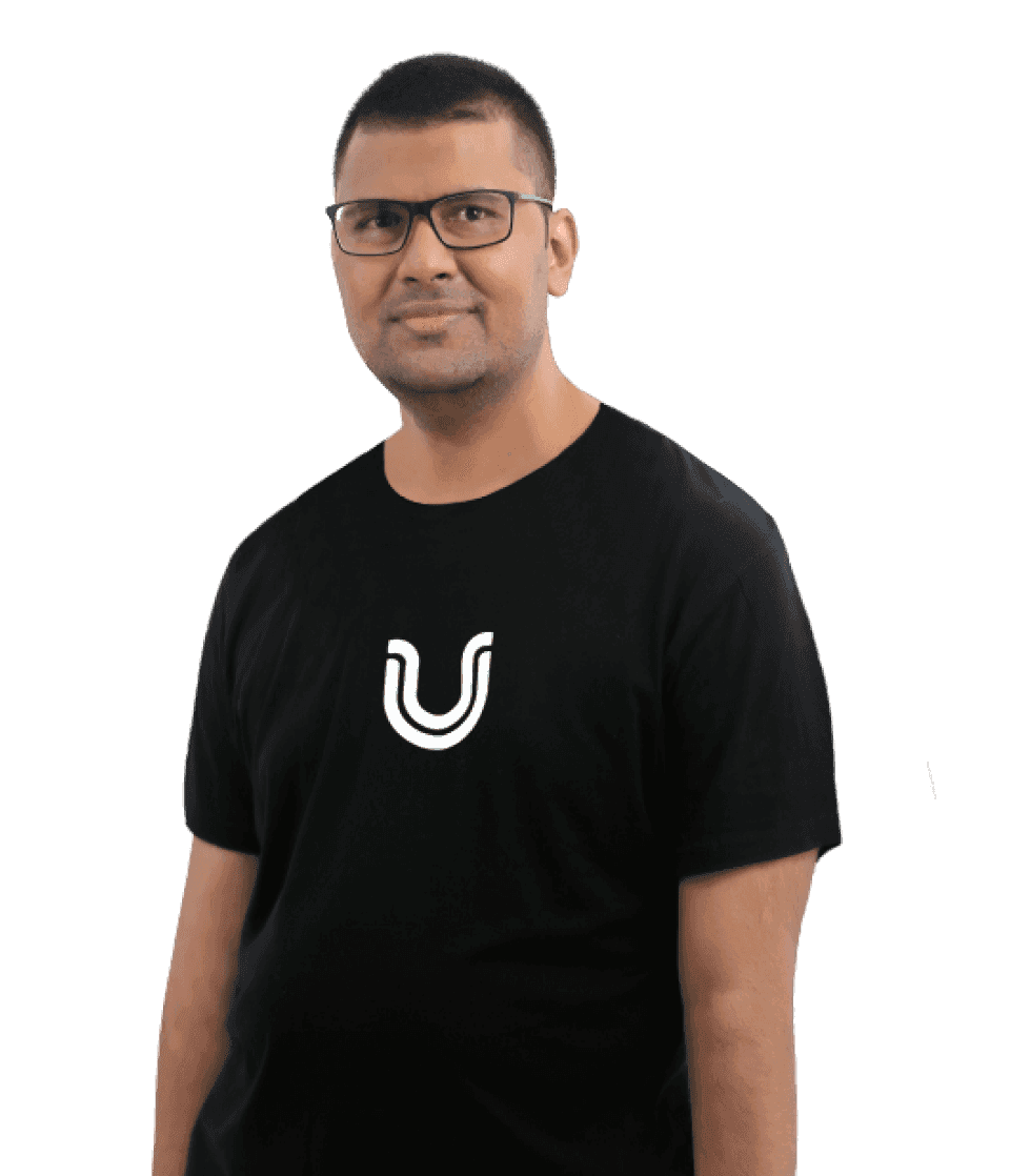 Portrait image of Raghavendra Satish Peri, UserWay's Director of Accessibility, wearing a black shirt adorned with the 'U' symbol from the UserWay logo.