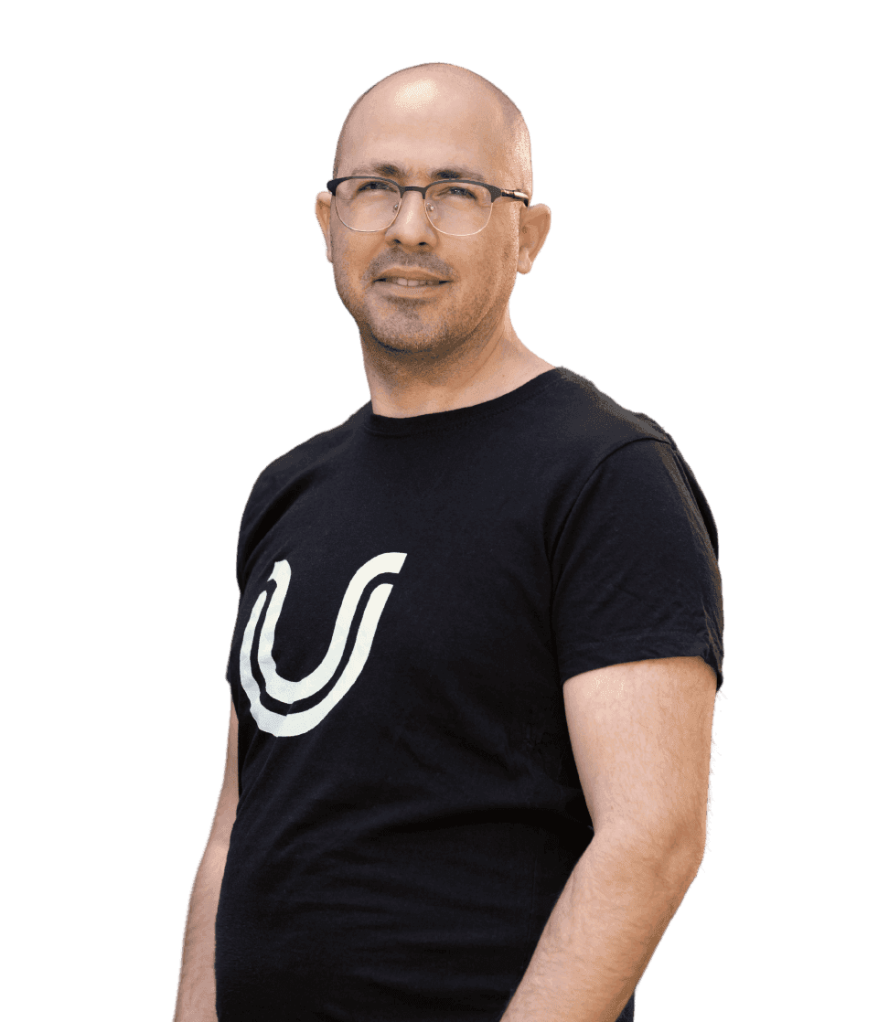 Portrait image of Shahar Amiel, UserWay's VP Growth, wearing a black shirt adorned with the 'U' symbol from the UserWay logo.