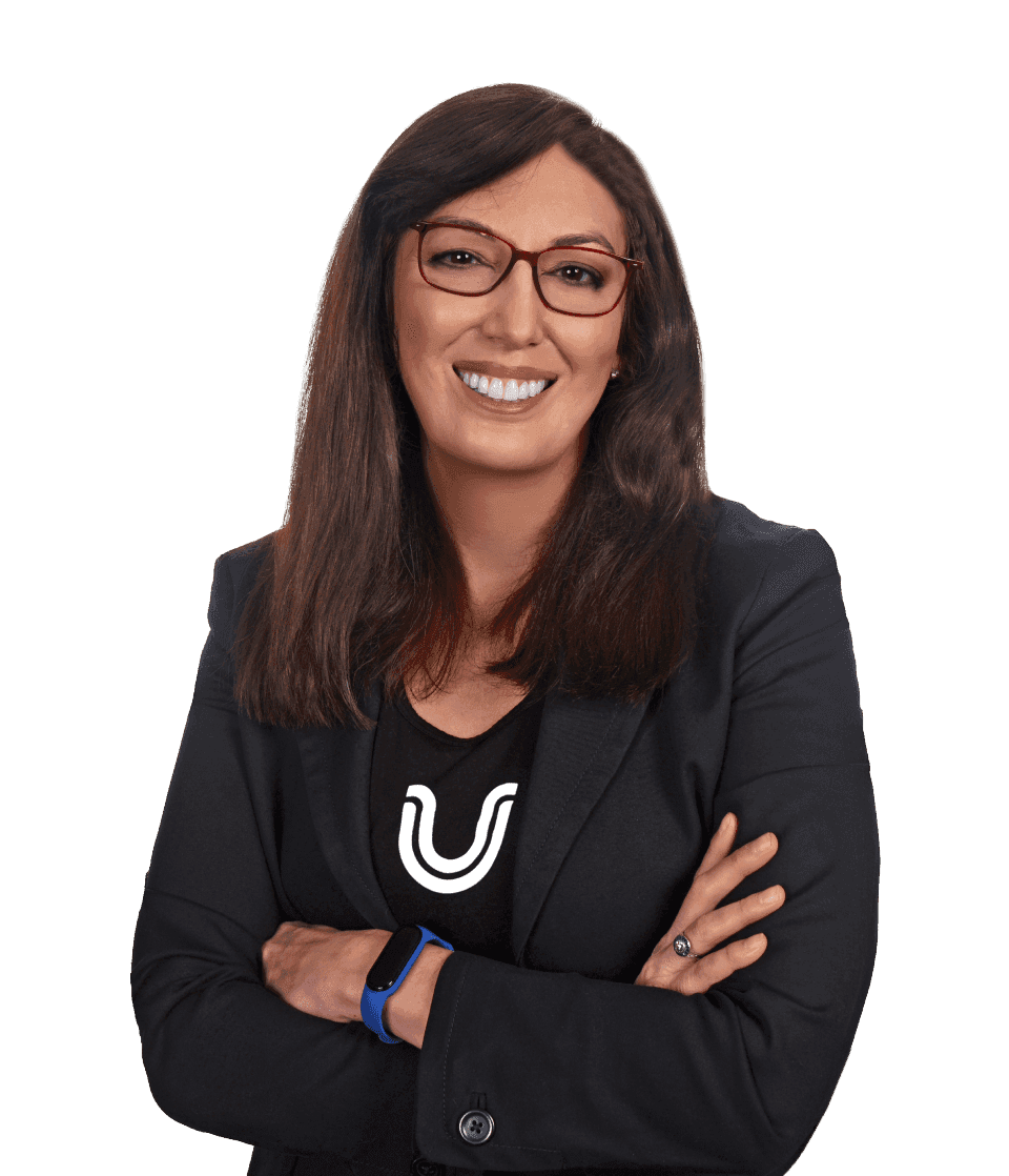Portrait image of Shira Grossman, UserWay's Head of Legal Affairs and Innovation, wearing a black shirt adorned with the 'U' symbol from the UserWay logo.