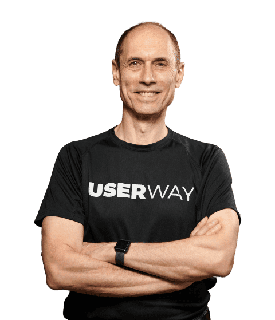 Portrait image of Lionel Wolberger, UserWay's COO, wearing a black shirt adorned with the 'U' symbol from the UserWay logo.