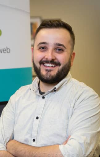 Headshot of Site Hub President Sean Mckay smiling